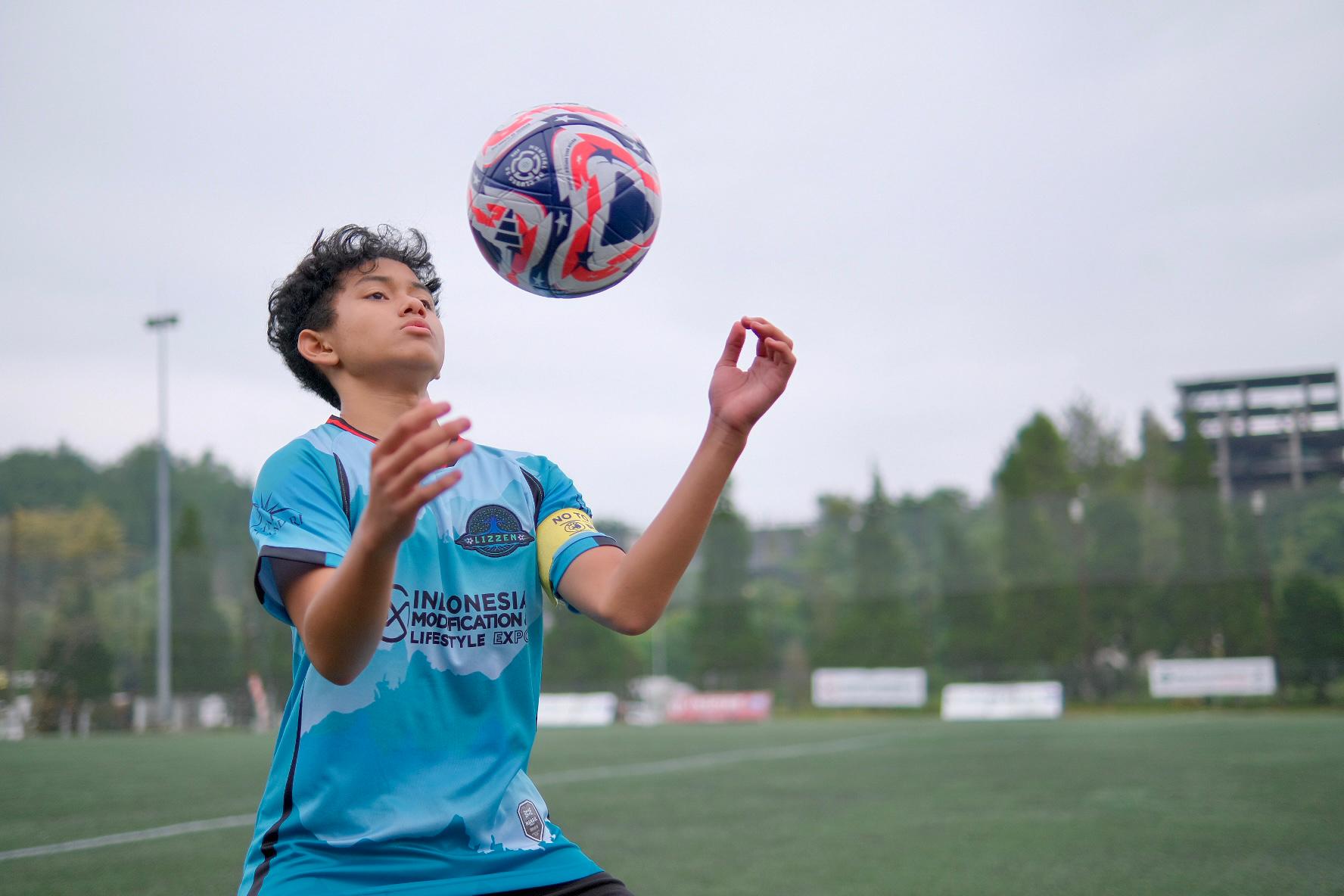 IMX Dukung Perkembangan Anak Muda Lewat Sepak Bola Bersama Lizzen Academy